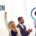 A group of co-workers gathered around a conference table clapping and giving high-fives recognizing their achievements with the slogan, "Recognition by Design, Not by Default." with the Incentive Services, Inc. logo.