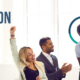 A group of co-workers gathered around a conference table clapping and giving high-fives recognizing their achievements with the slogan, "Recognition by Design, Not by Default." with the Incentive Services, Inc. logo.